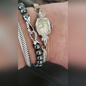 VINTAGE BULOVA 10KT WHITE ROLLED GOLD PLATE AND DIAMOND WATCH